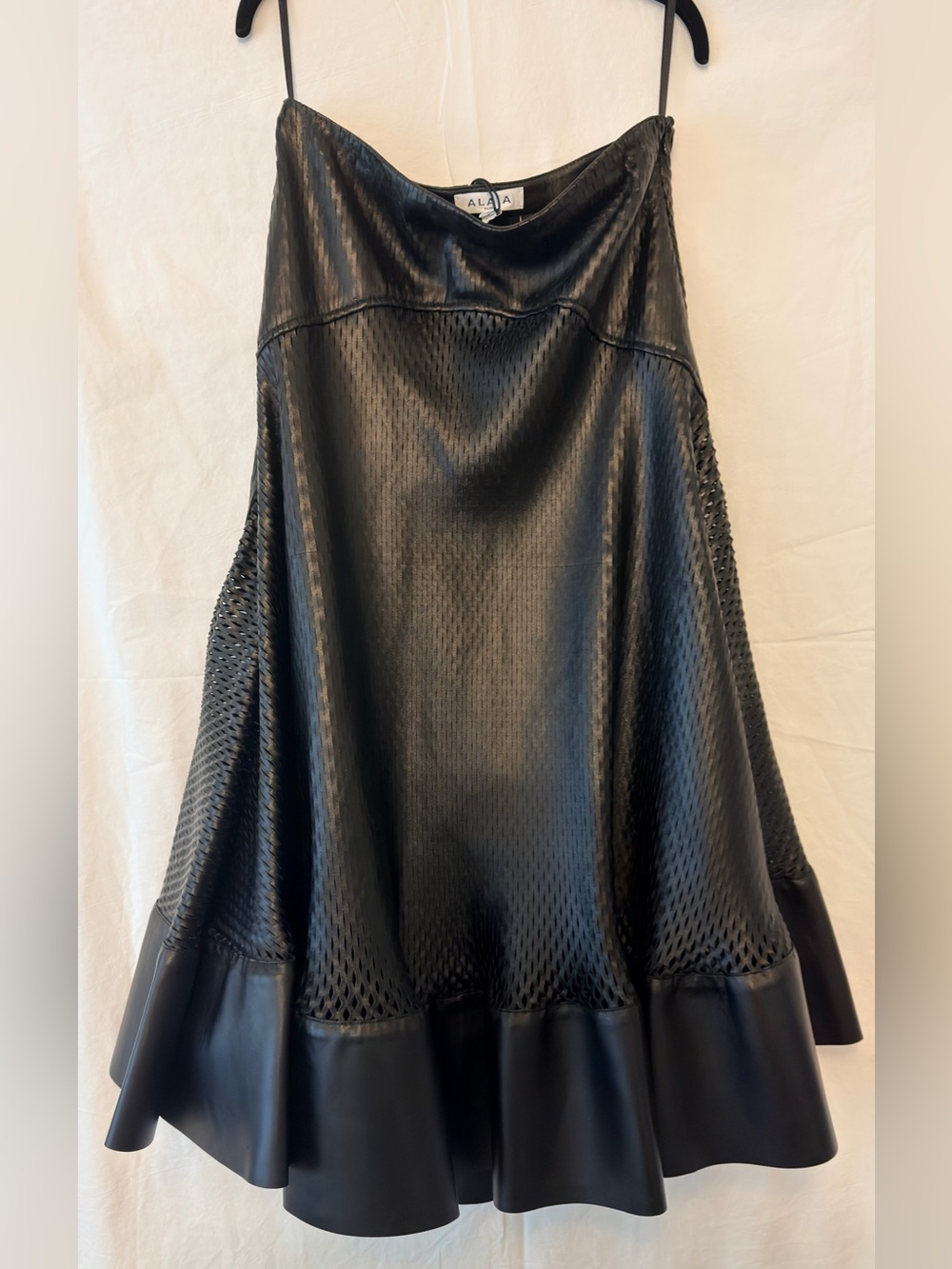 Alala Black Leaser- Cut Leather Skirt with Flared Ruffle Hem.